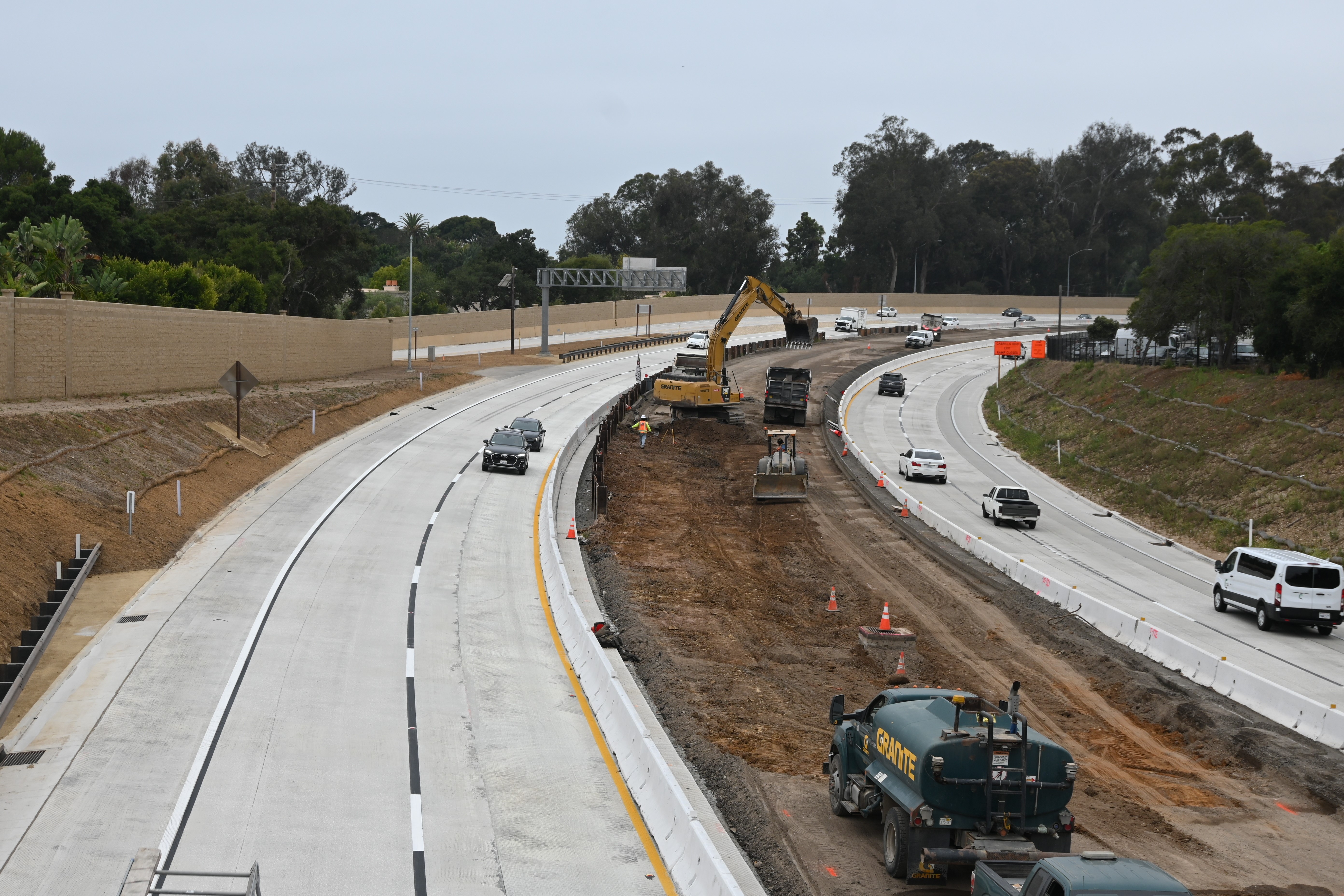 Construction crew works in Highway 101 median
